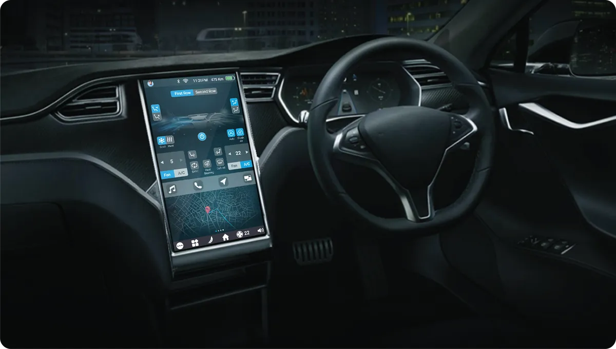 Close view of the infotainment display in the dashboard with large tiles for core functions